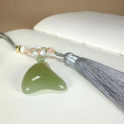 玉器工艺品天然新疆和田玉青海料晴水色玉石刮痧板和田玉供应链图3